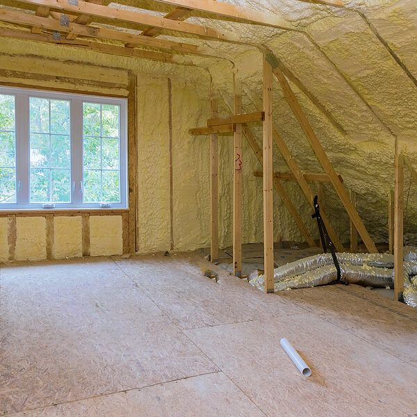 a room that is under construction with a lot of wood